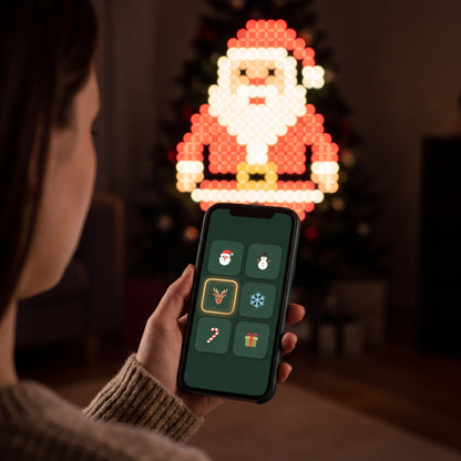 Choosing a MerryGlow tree design from the phone app in a dark living room